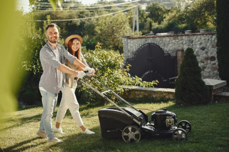 Push Lawn mower people working on the backyard