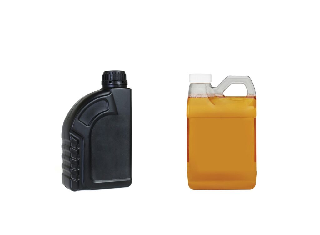 two plastic bottle of engine oil