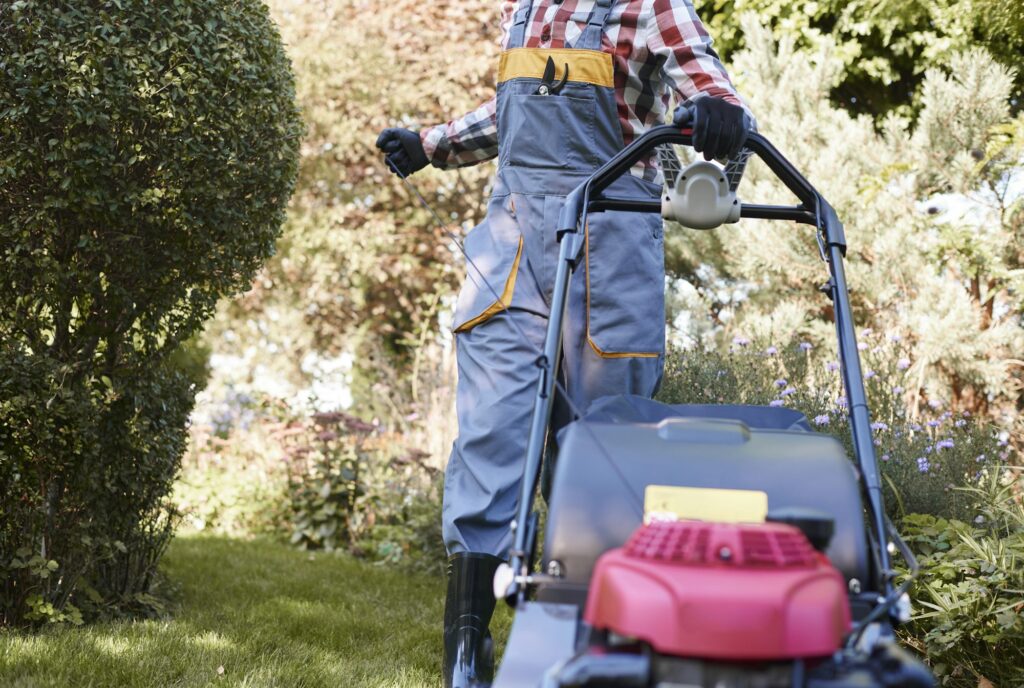 pulling the lawn mower starter cord